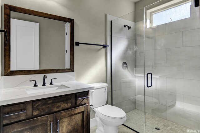 1791 La Cita, Minden, NV 89423 - bathroom featuring toilet, a stall shower, and vanity