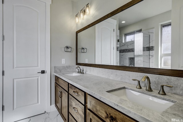 1791 La Cita, Minden, NV 89423 - bathroom with marble look tile flooring, walk in shower, and double vanity