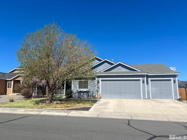 1090 Aster Ln, Fernley, NV 89408 - view of front of property with an attached garage and driveway