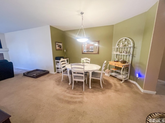 1090 Aster Ln, Fernley, NV 89408 - dining area with carpet floors and baseboards
