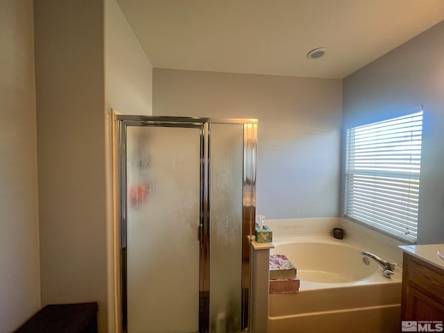 1090 Aster Ln, Fernley, NV 89408 - full bath with vanity, a bath, and a shower stall