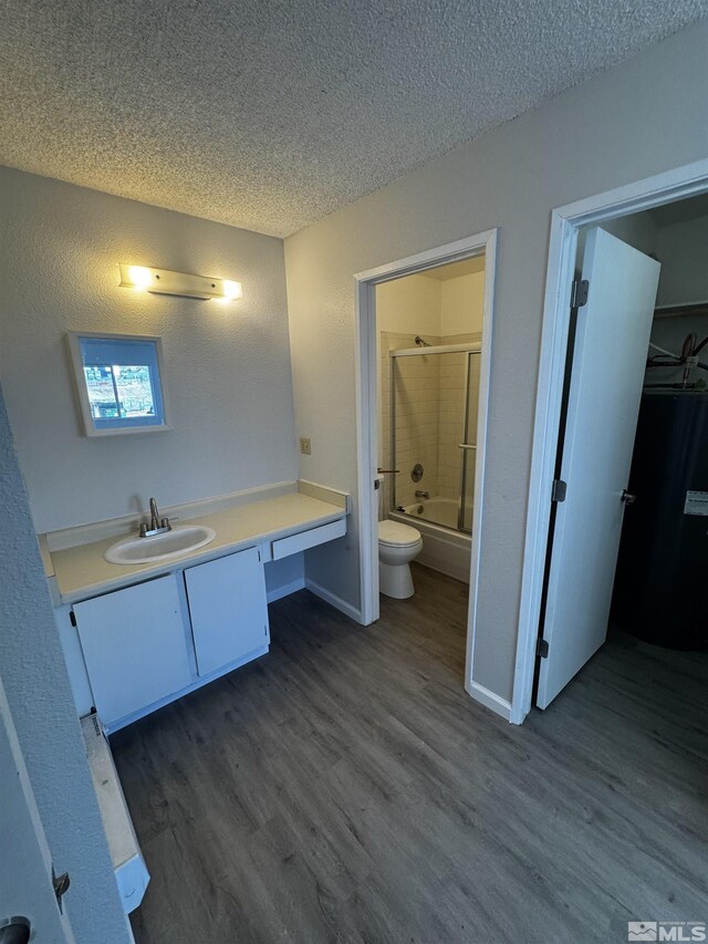 2375 Tripp Dr Unit 6, Reno, NV 89512 - bathroom featuring water heater, a textured ceiling, wood finished floors, vanity, and toilet