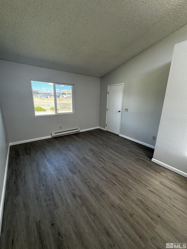 2375 Tripp Dr Unit 6, Reno, NV 89512 - empty room featuring a baseboard radiator, dark wood-style flooring, a textured ceiling, and baseboards