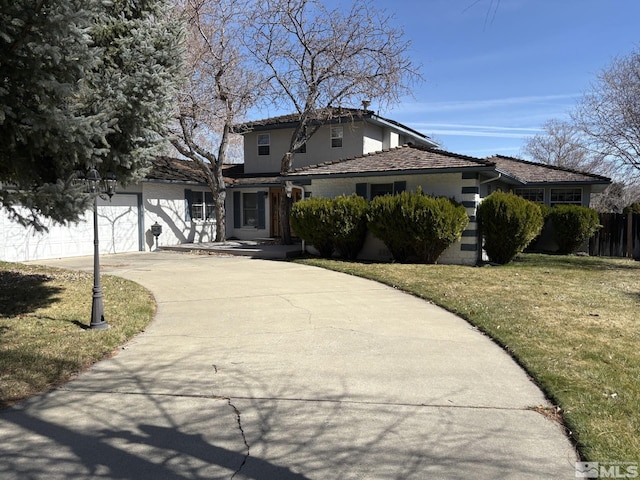 3 Comstock Cir, Carson City, NV 89703 - traditional-style home featuring driveway and a garage