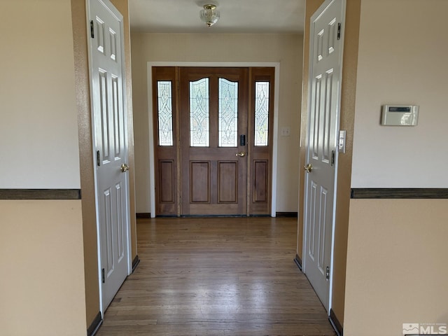 3 Comstock Cir, Carson City, NV 89703 - entrance foyer with wood-type flooring and baseboards