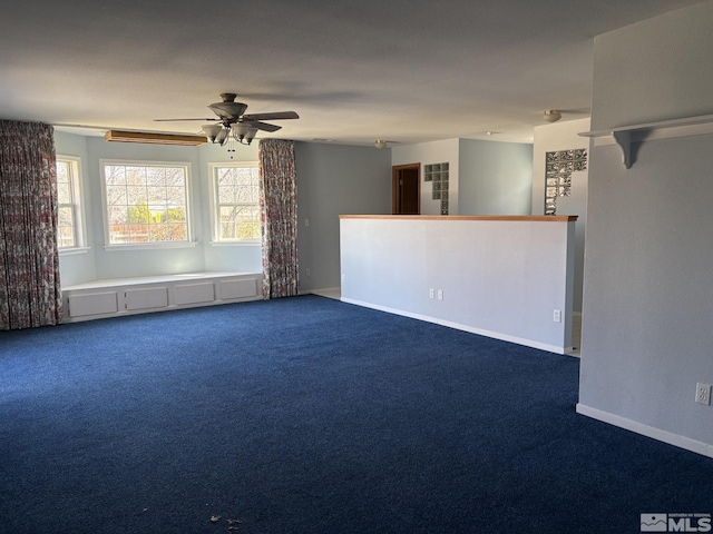 3 Comstock Cir, Carson City, NV 89703 - empty room featuring dark carpet, ceiling fan, and baseboards