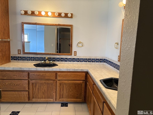 3 Comstock Cir, Carson City, NV 89703 - bathroom featuring tile patterned flooring, backsplash, and vanity