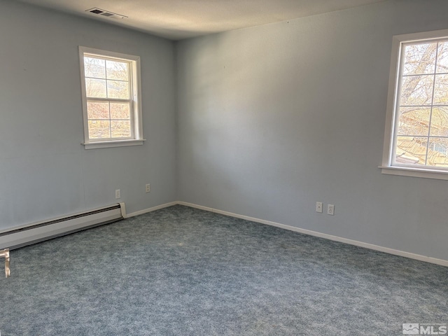 3 Comstock Cir, Carson City, NV 89703 - unfurnished room featuring plenty of natural light, a baseboard heating unit, carpet floors, and baseboards