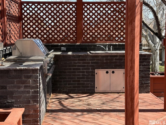 3 Comstock Cir, Carson City, NV 89703 - wooden deck featuring exterior kitchen and a sink