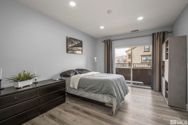 17000 Wedge Pkwy Unit 3221, Reno, NV 89511 - bedroom with light wood-type flooring, access to exterior, and recessed lighting