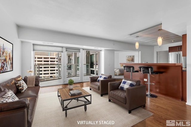 255 N Sierra St Unit 815, Reno, NV 89501 - living room with wood finished floors