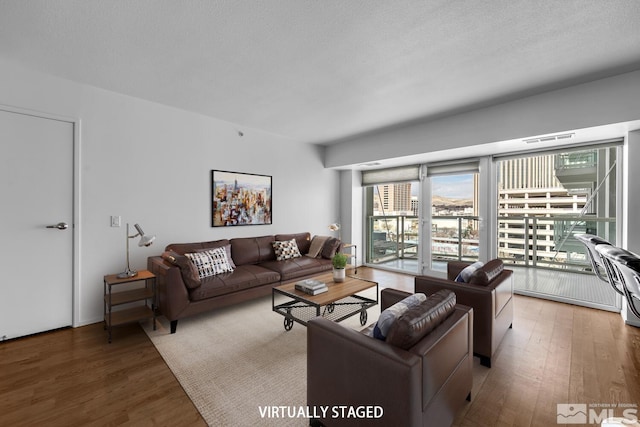 255 N Sierra St Unit 815, Reno, NV 89501 - living area with wood finished floors