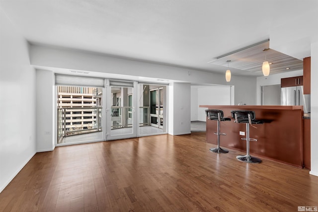 255 N Sierra St Unit 815, Reno, NV 89501 - living room with wood finished floors and baseboards