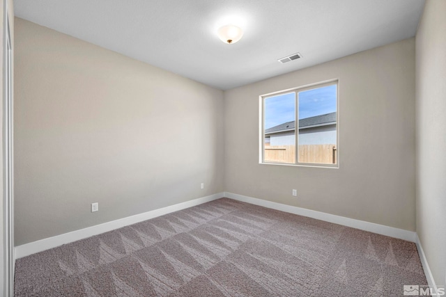 21 Nova Ct Unit 111, Carson City, NV 89705 - empty room featuring carpet flooring and baseboards