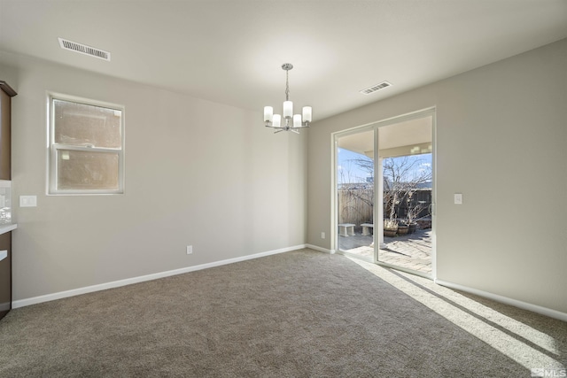 7117 Mustengo Dr, Reno, NV 89506 - unfurnished dining area featuring a chandelier, carpet flooring, and baseboards