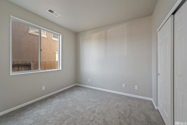 7117 Mustengo Dr, Reno, NV 89506 - unfurnished bedroom with carpet, baseboards, and a closet