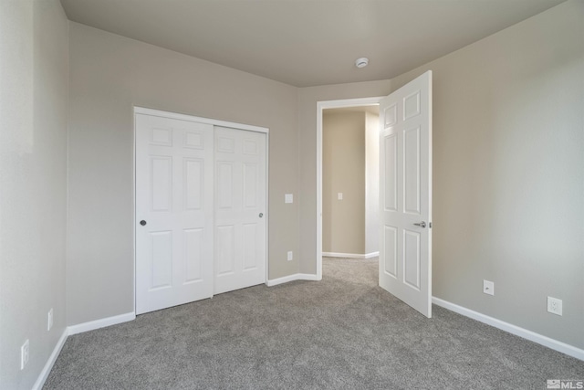 7117 Mustengo Dr, Reno, NV 89506 - unfurnished bedroom featuring carpet floors, a closet, and baseboards