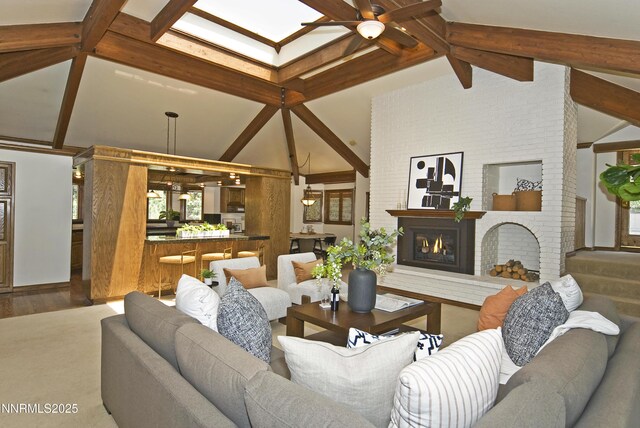 205 Scotch Pine Rd, Reno, NV 89511 - living room with a ceiling fan, a brick fireplace, and wood finished floors