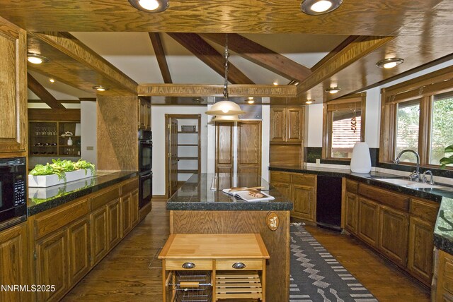 205 Scotch Pine Rd, Reno, NV 89511 - kitchen featuring a sink, black appliances, dark countertops, beam ceiling, and dark wood finished floors