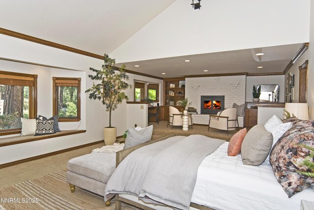 205 Scotch Pine Rd, Reno, NV 89511 - carpeted bedroom with a brick fireplace, recessed lighting, baseboards, high vaulted ceiling, and crown molding
