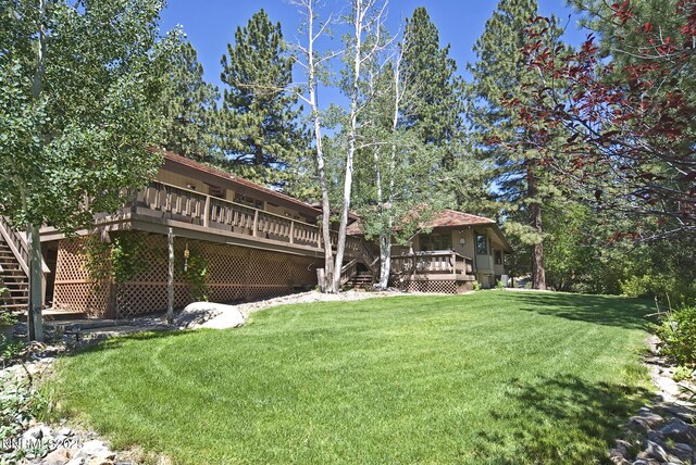 205 Scotch Pine Rd, Reno, NV 89511 - view of grassy yard with a deck