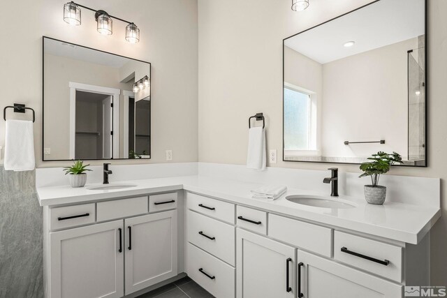 2665 Rockview Dr, Reno, NV 89519 - full bath with double vanity and tile patterned flooring
