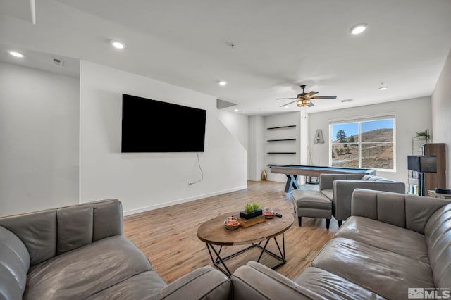 5030 Ronald Stephen Cir, Reno, NV 89503 - living area featuring light wood-style flooring, ceiling fan, recessed lighting, and baseboards