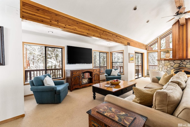 513 Lucille Dr, Incline Village, NV 89451 - living area with a fireplace, light carpet, ceiling fan, baseboards, and lofted ceiling