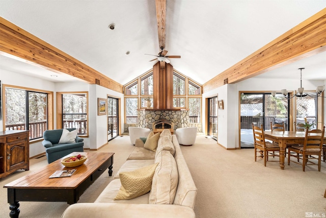 513 Lucille Dr, Incline Village, NV 89451 - living room with a chandelier, a ceiling fan, light colored carpet, a stone fireplace, and healthy amount of natural light