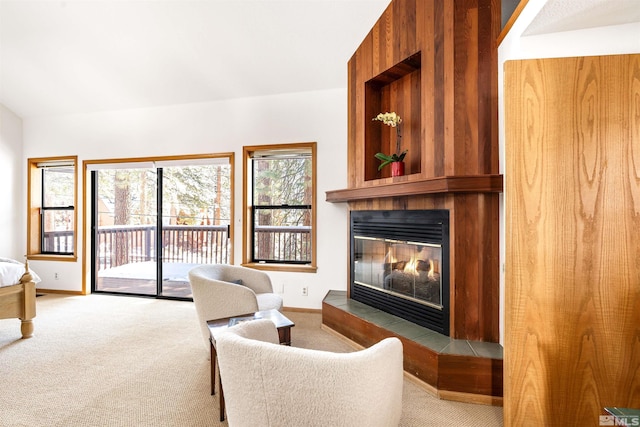 513 Lucille Dr, Incline Village, NV 89451 - carpeted living room with a tiled fireplace and baseboards