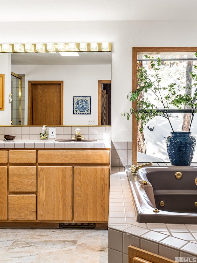 513 Lucille Dr, Incline Village, NV 89451 - bathroom featuring vanity and a whirlpool tub