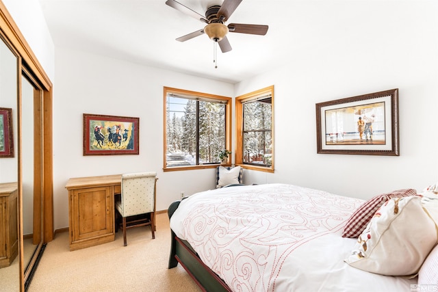 513 Lucille Dr, Incline Village, NV 89451 - bedroom featuring light colored carpet, a closet, baseboards, and a ceiling fan