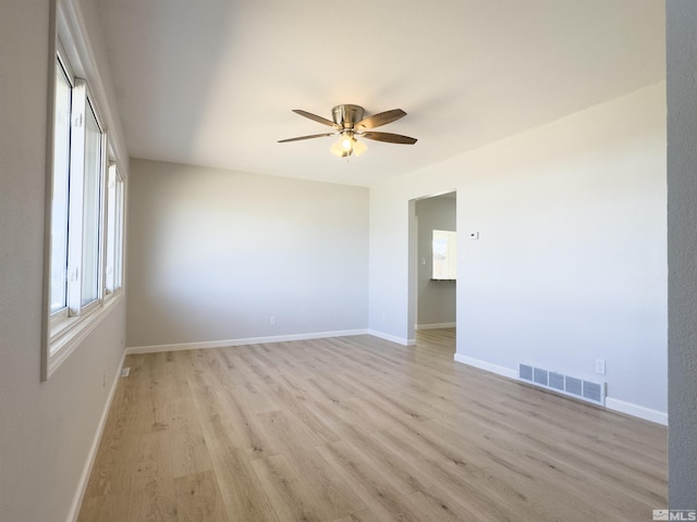675 L St, Hawthorne, NV 89415 - spare room with light wood finished floors, a ceiling fan, and baseboards
