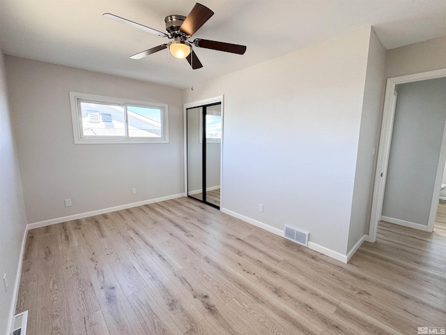675 L St, Hawthorne, NV 89415 - unfurnished bedroom featuring light wood-type flooring, a closet, baseboards, and a ceiling fan