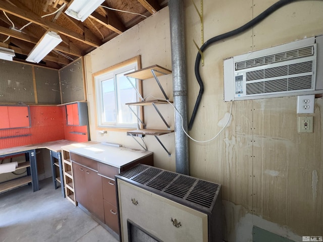 675 L St, Hawthorne, NV 89415 - below grade area featuring a workshop area and a wall mounted air conditioner