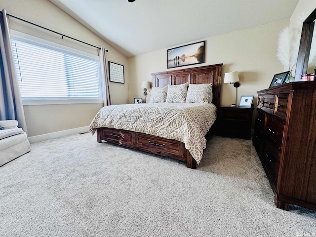 629 Ross St, Winnemucca, NV 89445 - bedroom with lofted ceiling, light carpet, and baseboards