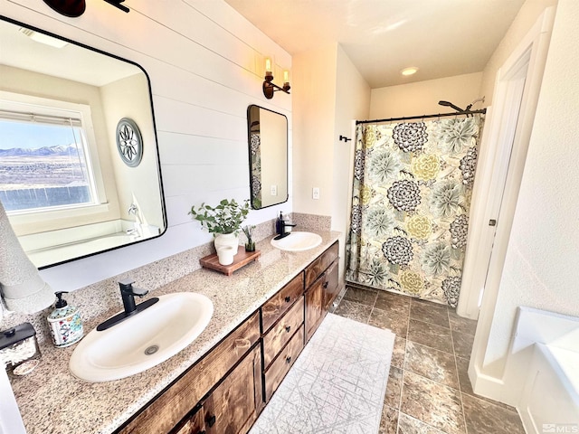 629 Ross St, Winnemucca, NV 89445 - bathroom with double vanity, a shower with curtain, and stone finish floors