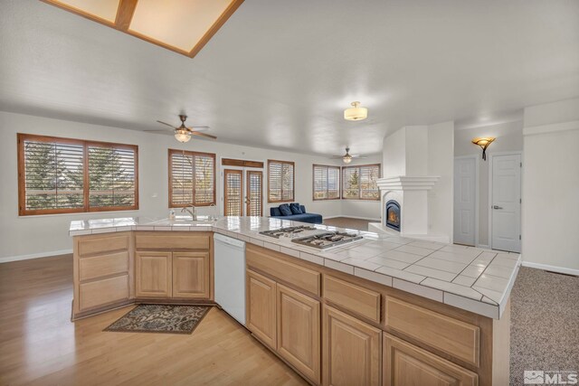 1568 Barker Ct, Gardnerville, NV 89410 - kitchen featuring white appliances, ceiling fan, tile countertops, and open floor plan