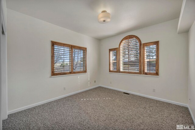 1568 Barker Ct, Gardnerville, NV 89410 - empty room with plenty of natural light, carpet, and baseboards