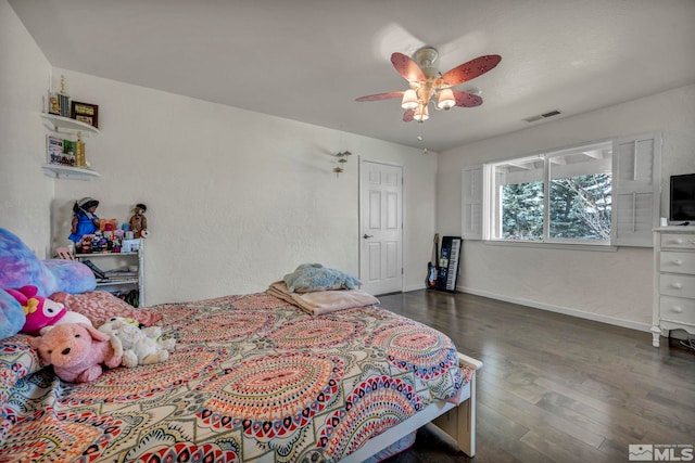 1568 Barker Ct, Gardnerville, NV 89410 - bedroom with wood finished floors, baseboards, and a ceiling fan