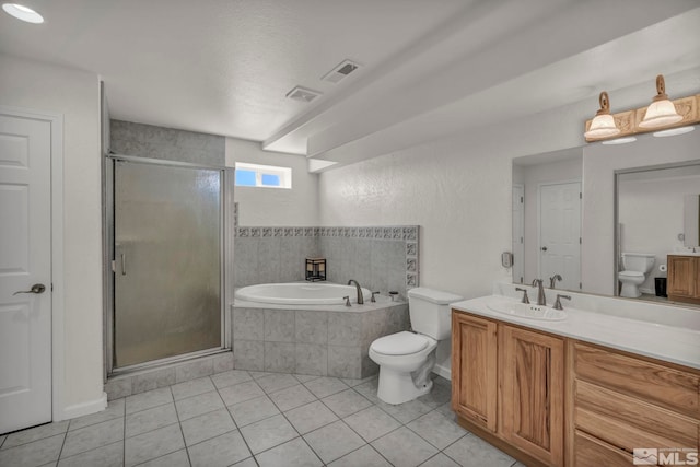 1568 Barker Ct, Gardnerville, NV 89410 - bathroom featuring toilet, a shower stall, vanity, a garden tub, and tile patterned floors