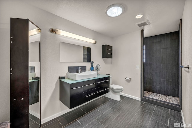 1568 Barker Ct, Gardnerville, NV 89410 - bathroom featuring toilet, baseboards, walk in shower, and vanity