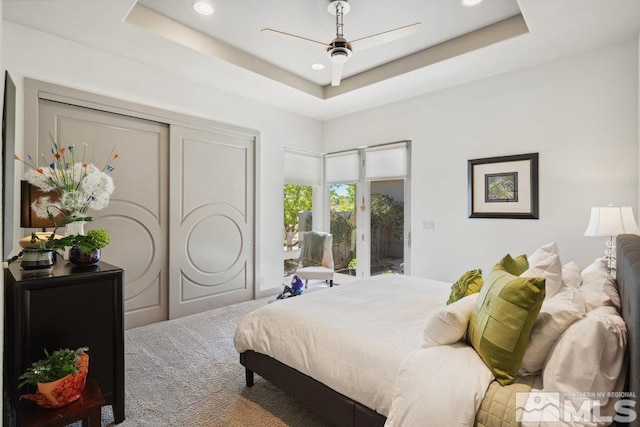 4020 Cocopah Ct, Reno, NV 89511 - bedroom featuring carpet flooring, a tray ceiling, recessed lighting, ceiling fan, and access to outside