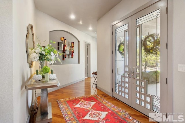 4020 Cocopah Ct, Reno, NV 89511 - foyer featuring french doors, wood finished floors, and recessed lighting
