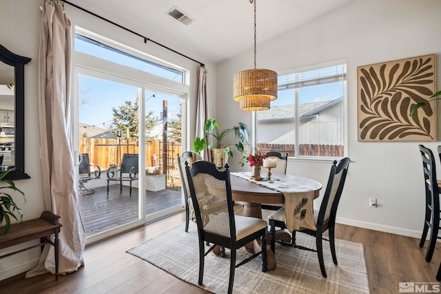 3550 Silverado, Carson City, NV 89705 - dining space featuring vaulted ceiling, wood finished floors, and baseboards