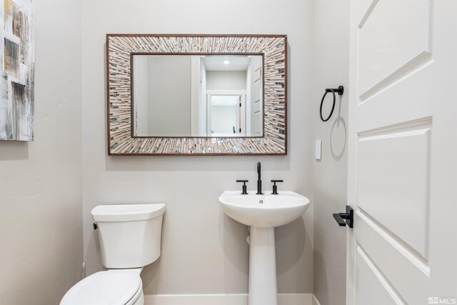 8956 Suncreek Trl, Reno, NV 89523 - bathroom with toilet and baseboards