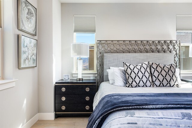8956 Suncreek Trl, Reno, NV 89523 - bedroom with light wood-type flooring and baseboards