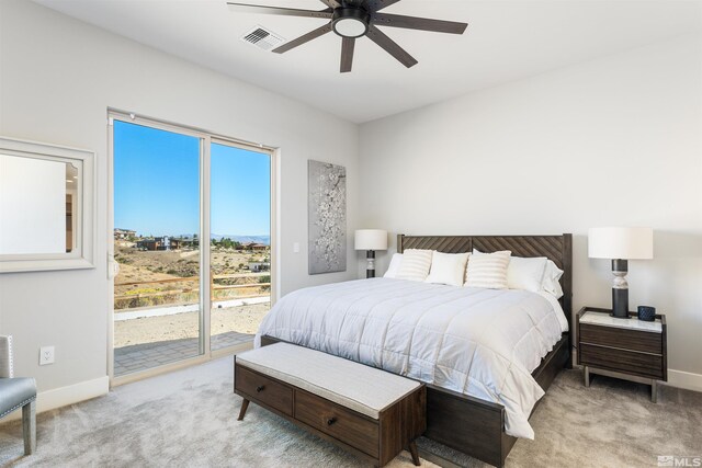 8956 Suncreek Trl, Reno, NV 89523 - bedroom featuring access to outside, carpet flooring, and ceiling fan