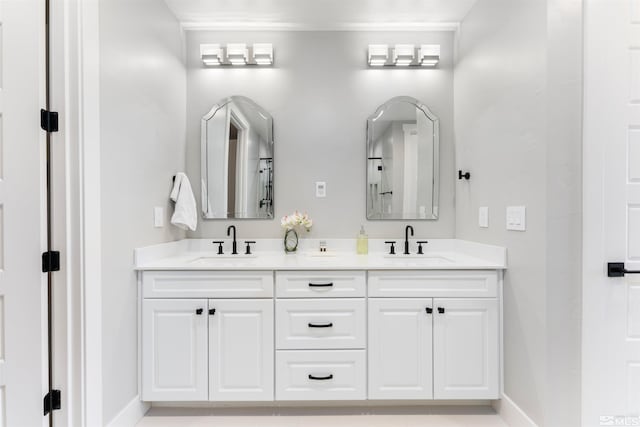 8956 Suncreek Trl, Reno, NV 89523 - bathroom featuring baseboards and double vanity