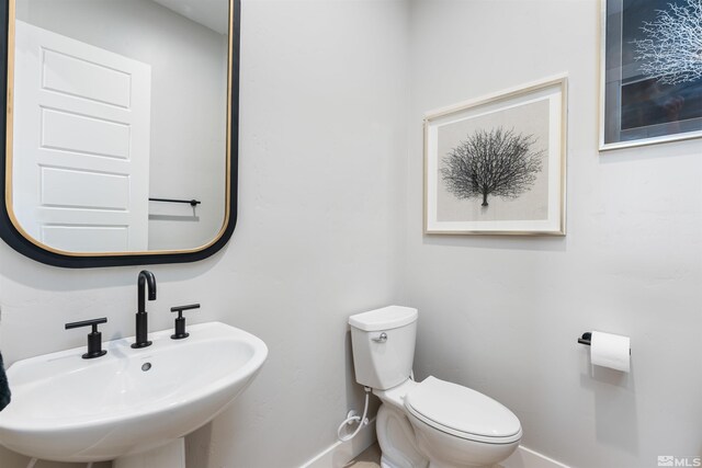 8956 Suncreek Trl, Reno, NV 89523 - half bath with a sink and baseboards